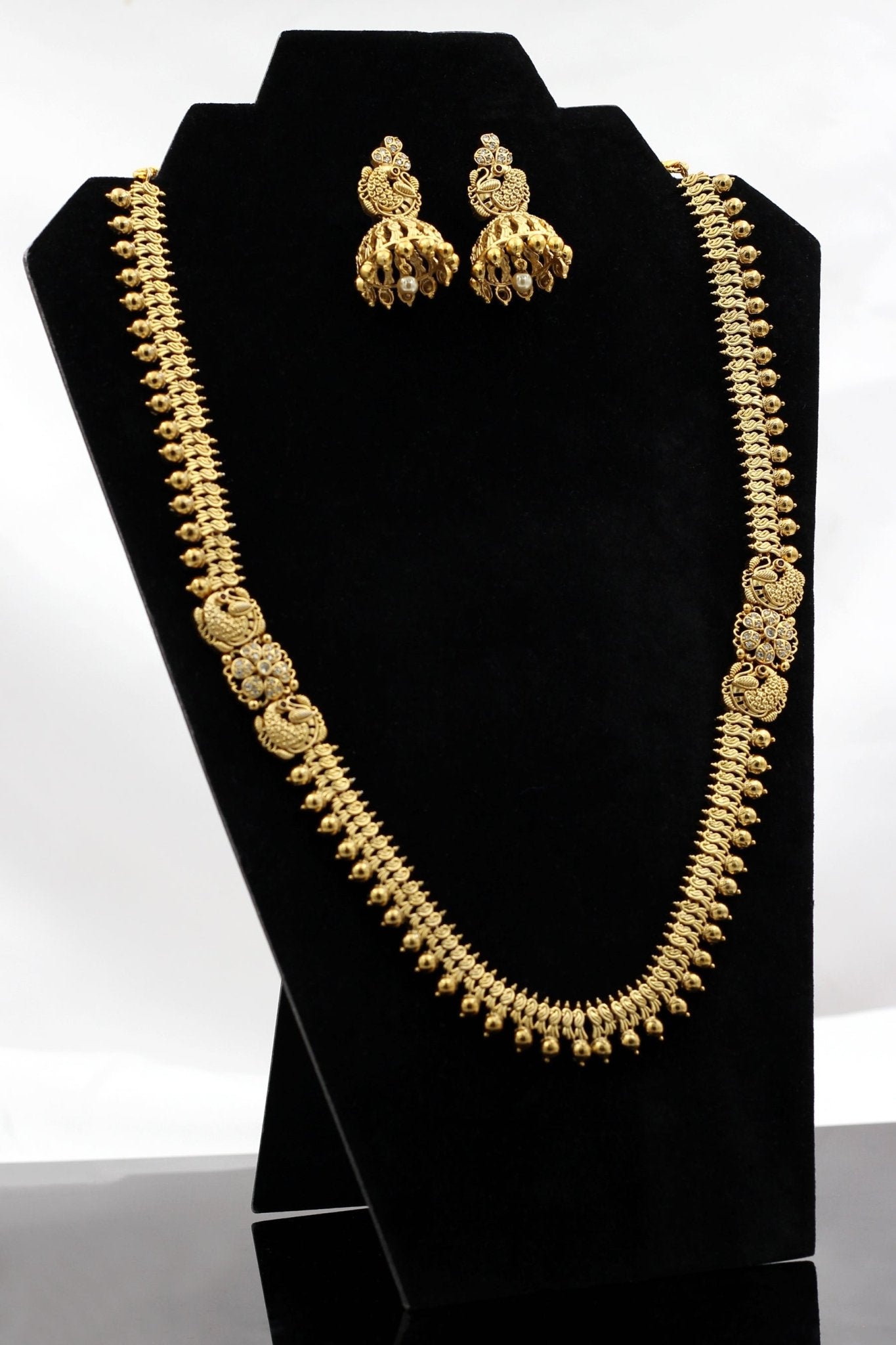 Glittering Gold-Polished Temple Jewelry Necklace Set with Jhumka Jewelry JCS Fashions