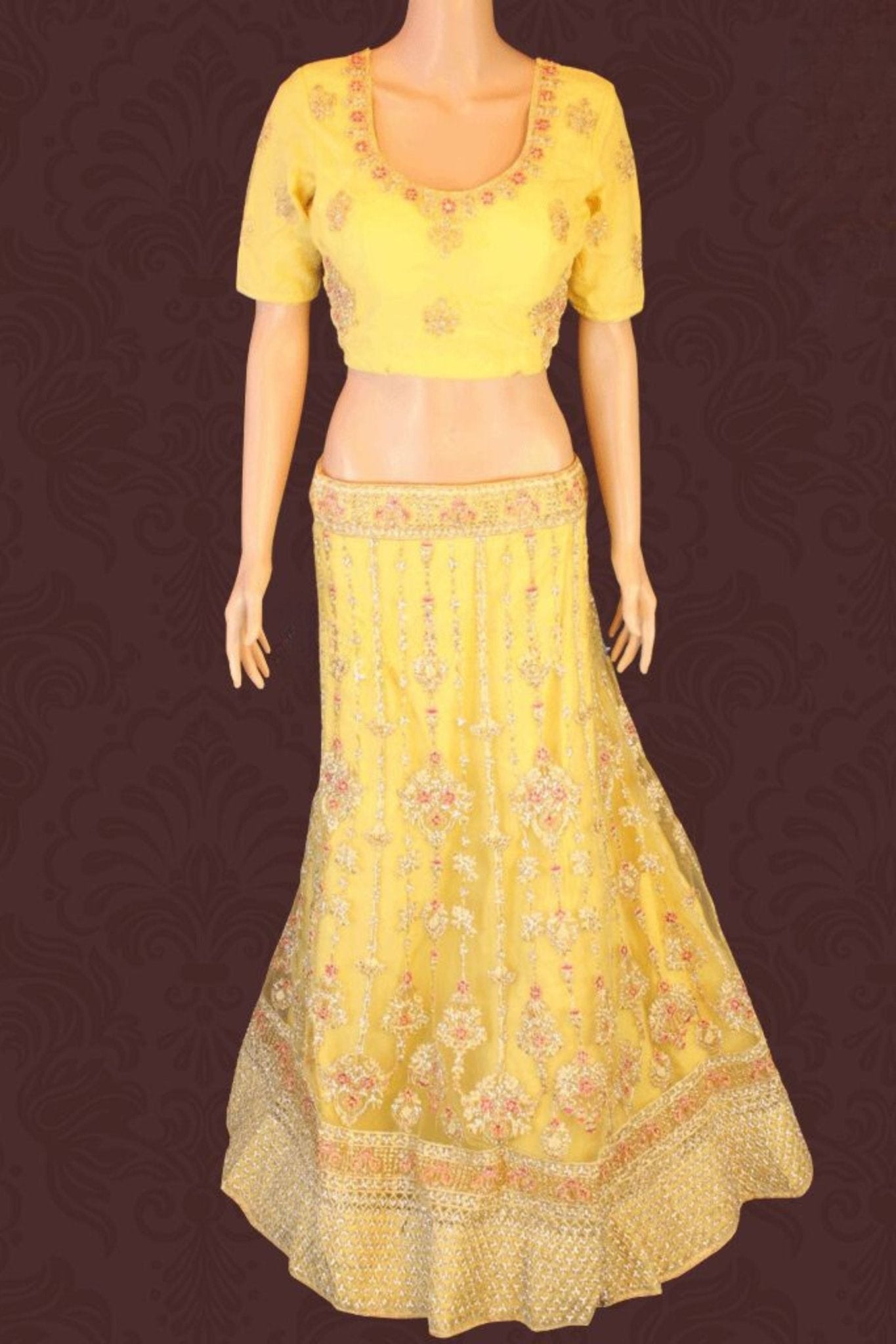 Heavy designer lehenga with embroidery & stone work in a pleasant yellow LEHANGA JCS Fashions