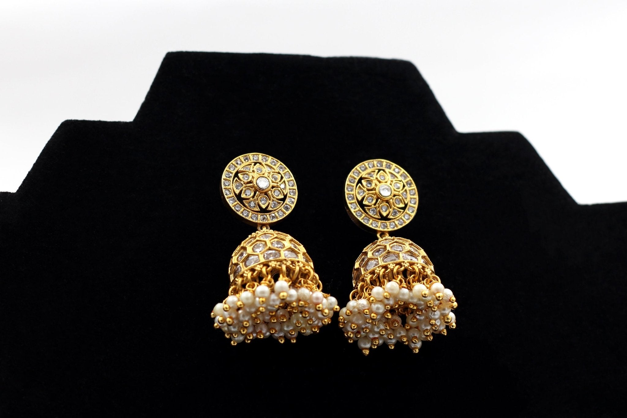 JCS Fashions' Gleaming Gold Jhumka Earrings with White Stones & Pearls Jewelry JCS Fashions