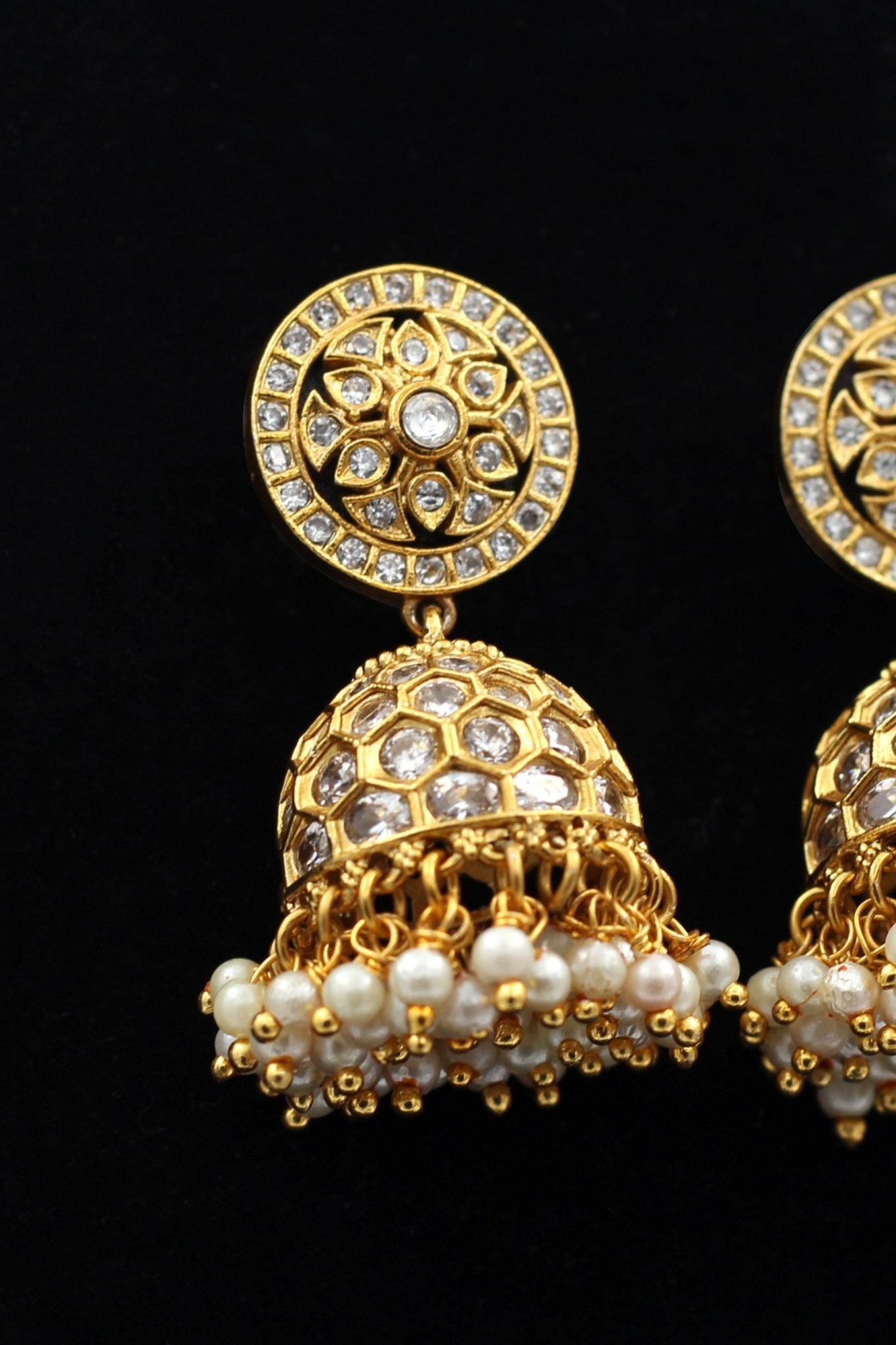 JCS Fashions' Gleaming Gold Jhumka Earrings with White Stones & Pearls Jewelry JCS Fashions