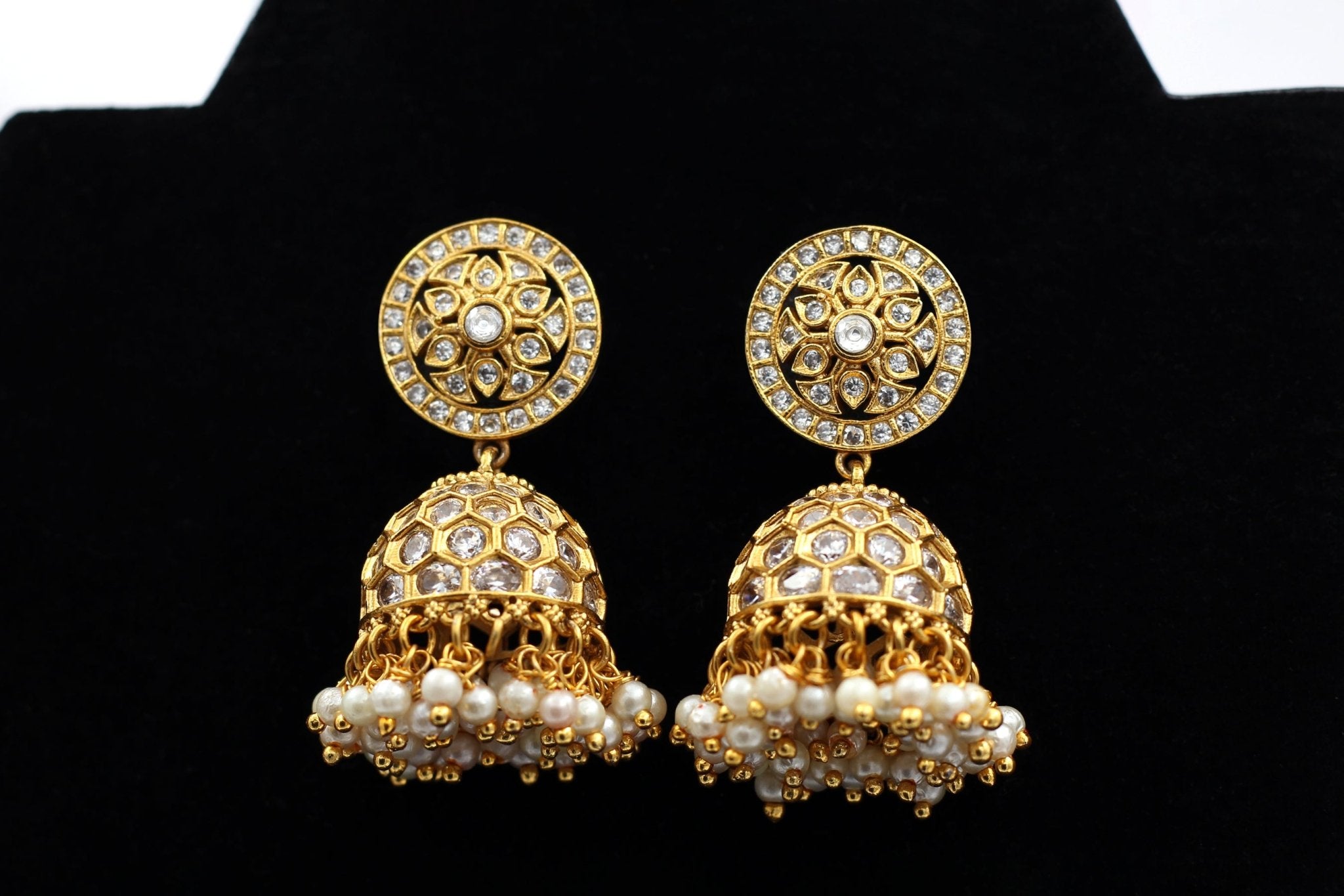 JCS Fashions' Gleaming Gold Jhumka Earrings with White Stones & Pearls Jewelry JCS Fashions