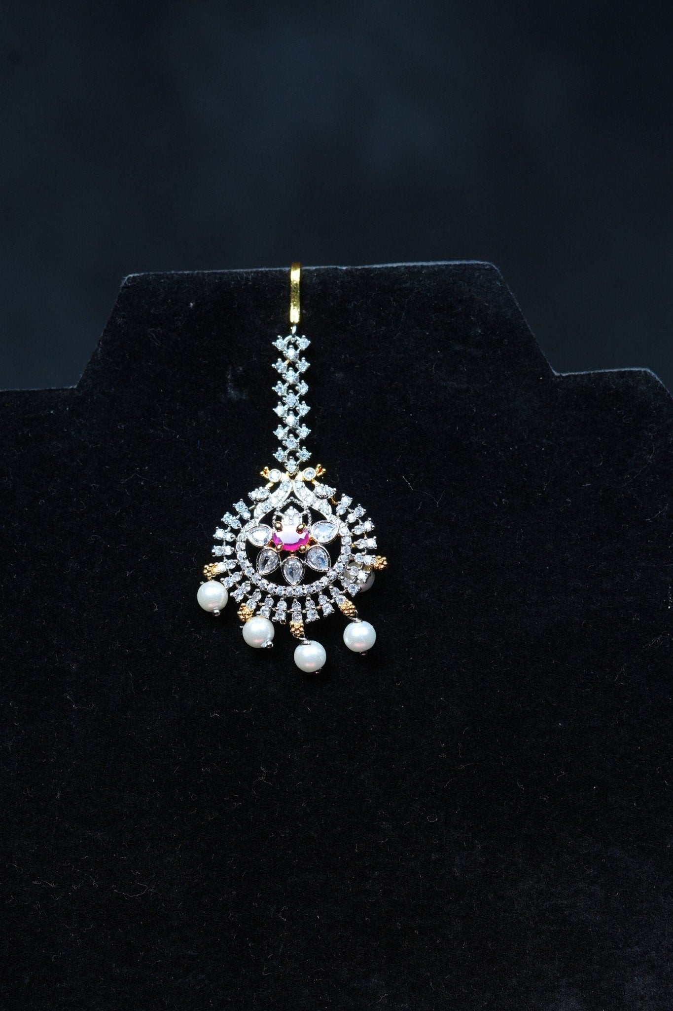 Radiant Elegance: Gold Polished Tikka with Sparkling AD Stones Jewelry JCS Fashions