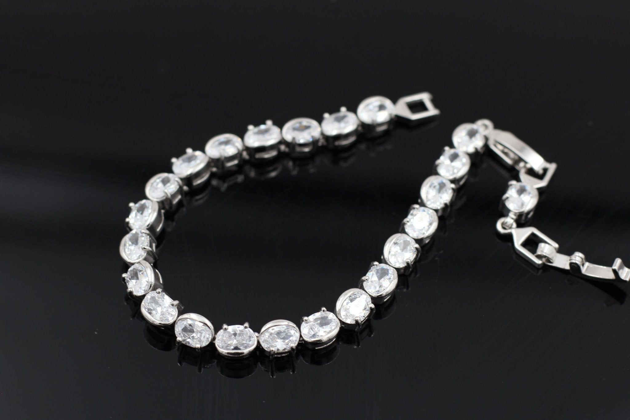 Sparkling Cubic Zirconia Tennis Bracelet in Silver Polish - 8 Inches Jewelry JCS Fashions