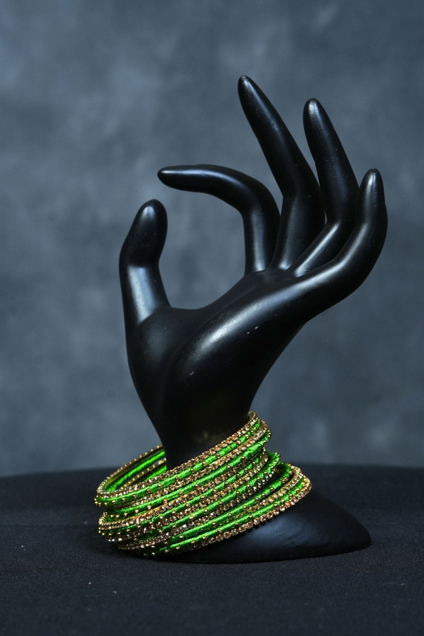 Green metal bangles with gold bead work — Diwali festive jewelry for NRI women 2026
