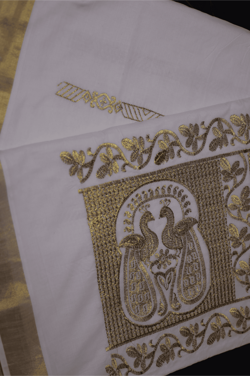 Kerala Cotton Saree with Elegant Peacock Motifs