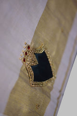Elegant Kerala Golden Tissue Saree with Aari Beadwork