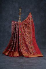 Elegant Ikkat Silk Saree with Luxurious Aari Work Contrast Blouse