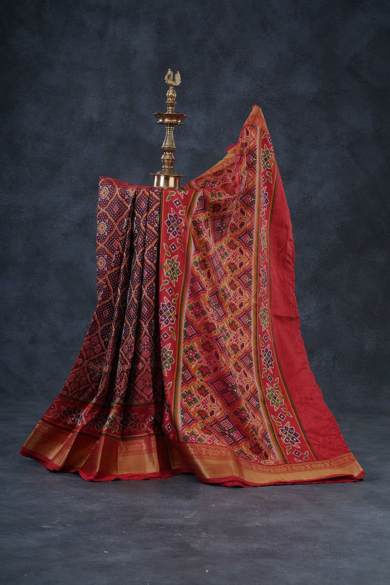 Elegant Ikkat Silk Saree with Luxurious Aari Work Contrast Blouse