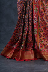 Elegant Ikkat Silk Saree with Luxurious Aari Work Contrast Blouse