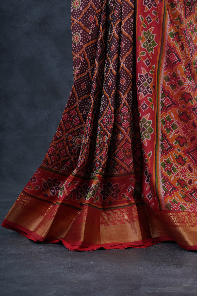 Elegant Ikkat Silk Saree with Luxurious Aari Work Contrast Blouse