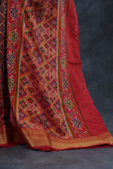 Elegant Ikkat Silk Saree with Luxurious Aari Work Contrast Blouse