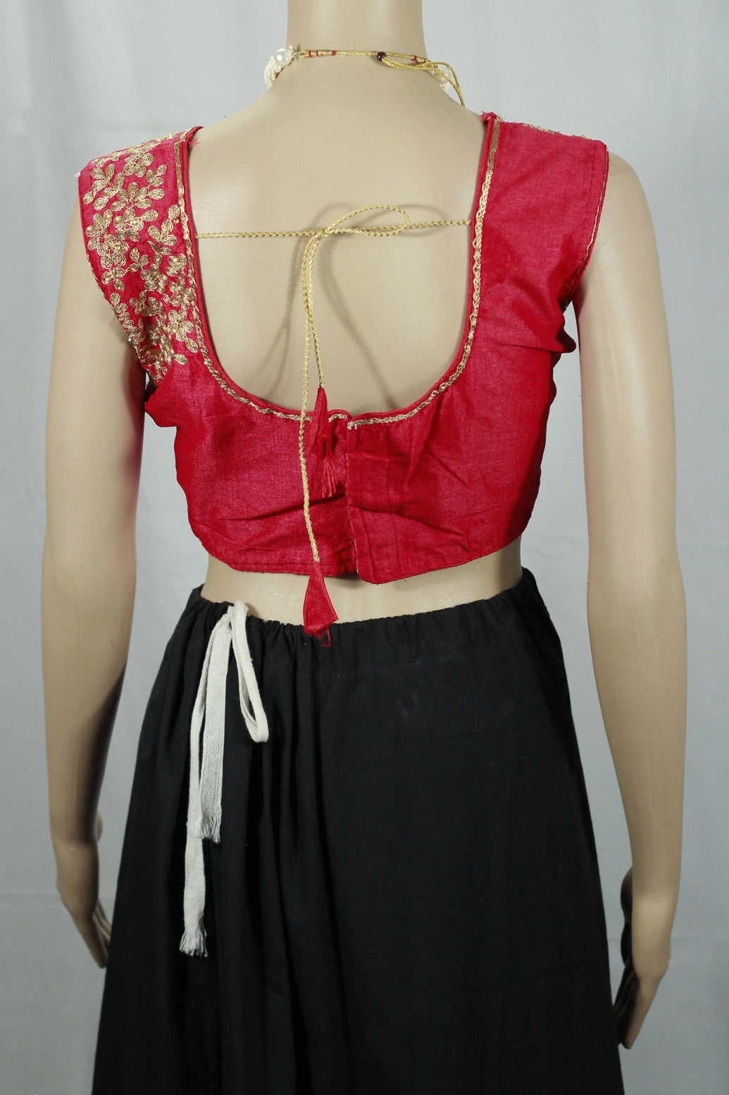Red Designer Padded Blouse With Golden Aari Work Floral Motifs, Back Knot & Sleeveless Design