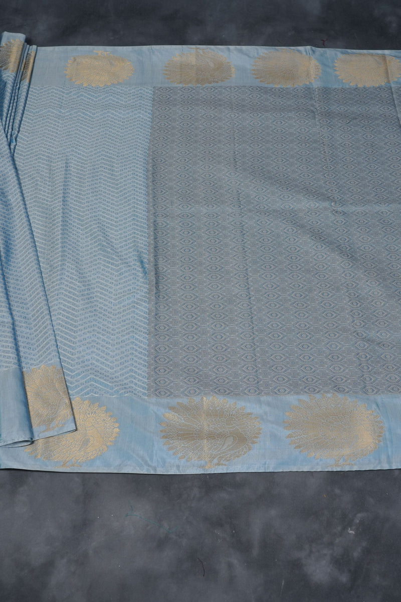 Embossed Kanchi Silk Saree: Peacock Zari Butta and Grand Pallu