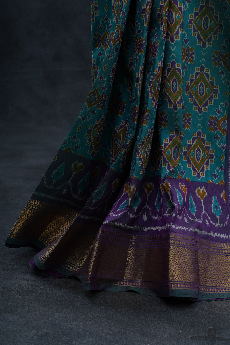 Exquisite Soft Ikkat Silk Saree with Aari Work Contrast Blouse
