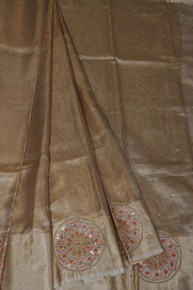 Gold Tissue Silk Sarees with Hand Embroidery and Maggam Work Blouse