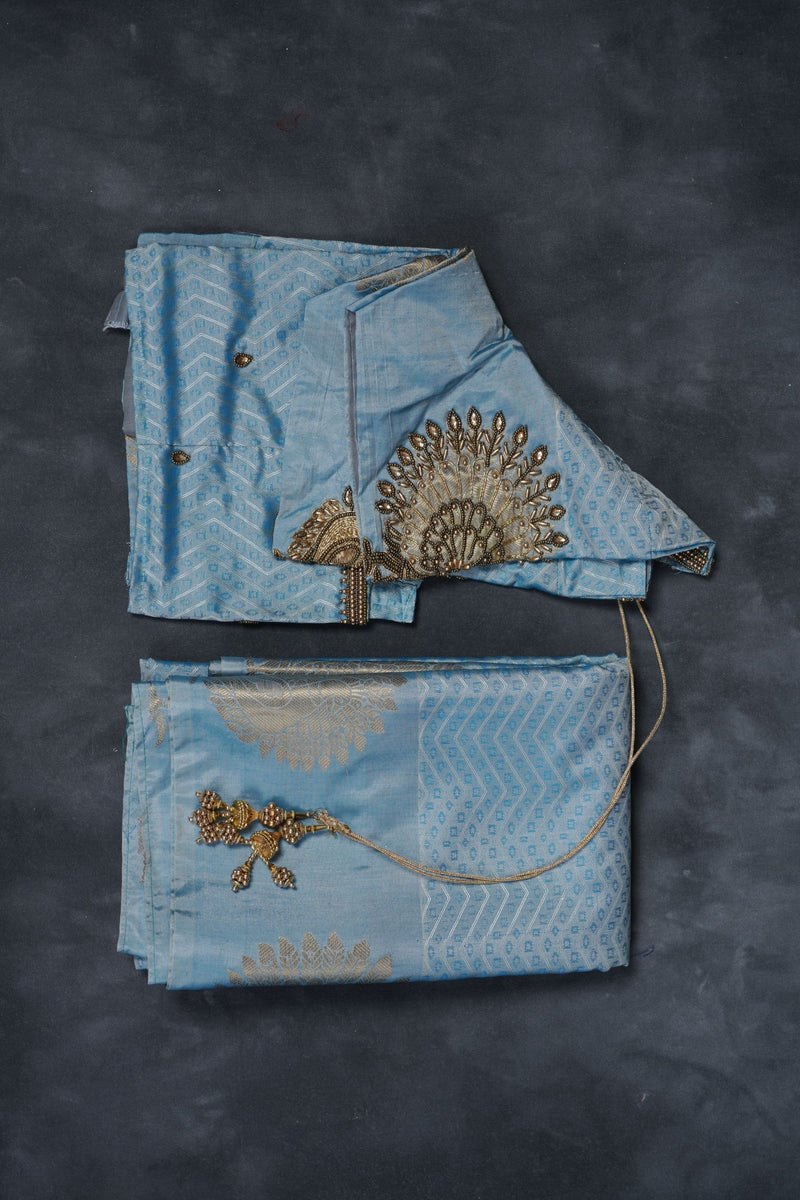 Embossed Kanchi Silk Saree: Peacock Zari Butta and Grand Pallu