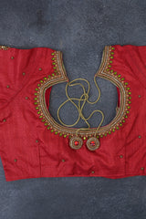 Elegant Ikkat Silk Saree with Luxurious Aari Work Contrast Blouse