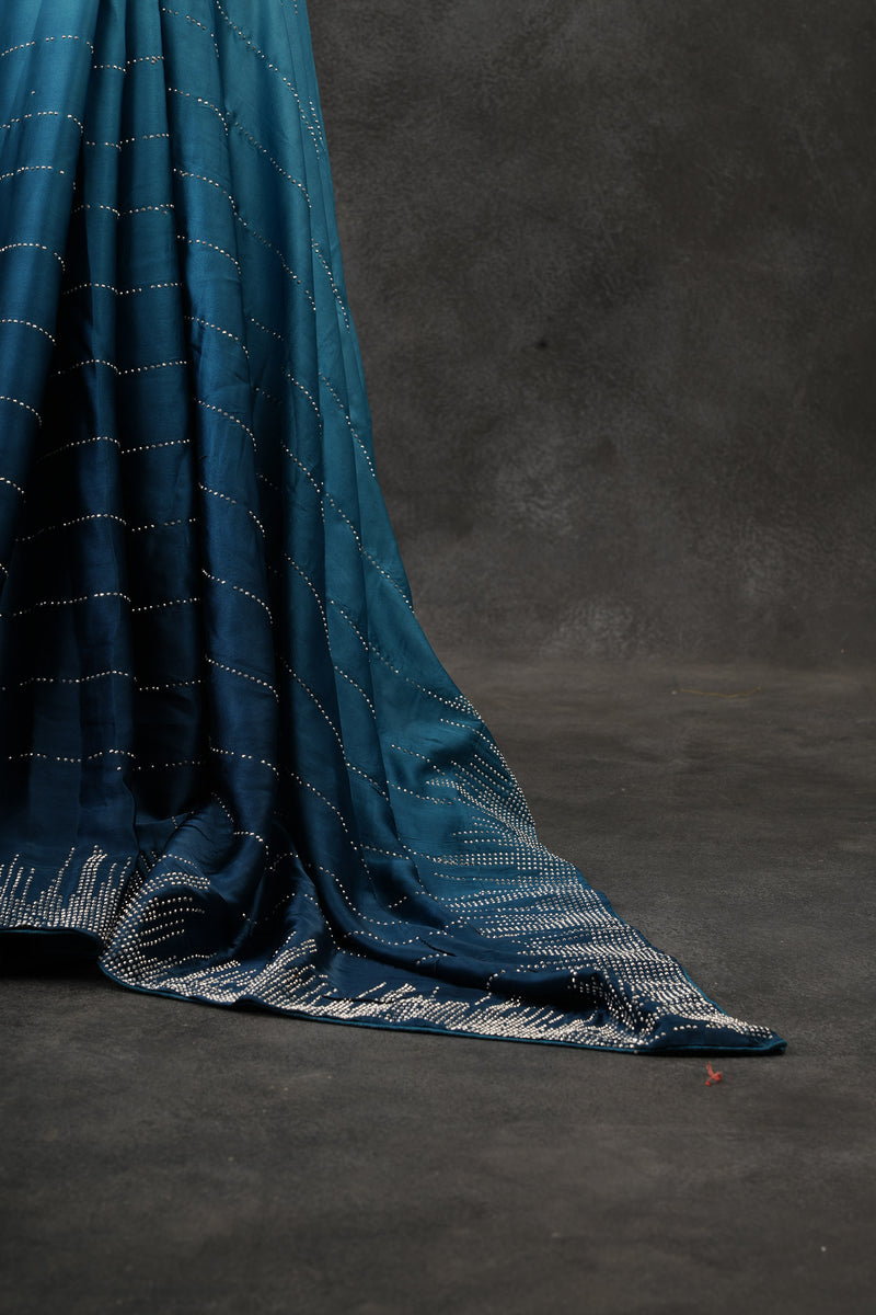 Graceful Japan Satin Saree in Dual-Blue Tones with Diamond Embellishments
