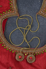 Elegant Ikkat Silk Saree with Luxurious Aari Work Contrast Blouse