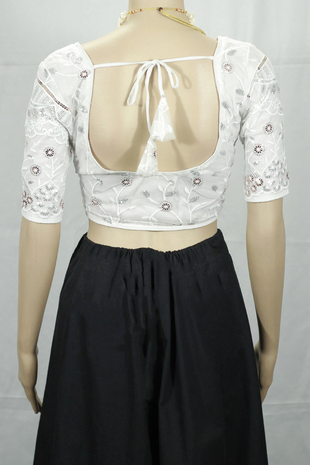 White Readymade Designer Padded Blouse with Aari Work Floral Motifs, Elbow Sleeves & Back Knot