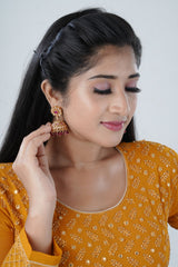 Regal Gold Kundan Jhumka Earrings - Handcrafted Accessory