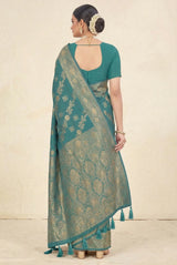 beautifully adorned with intricate zari weaving banarasi saree. The saree features delicate floral motifs woven across the body, complemente
