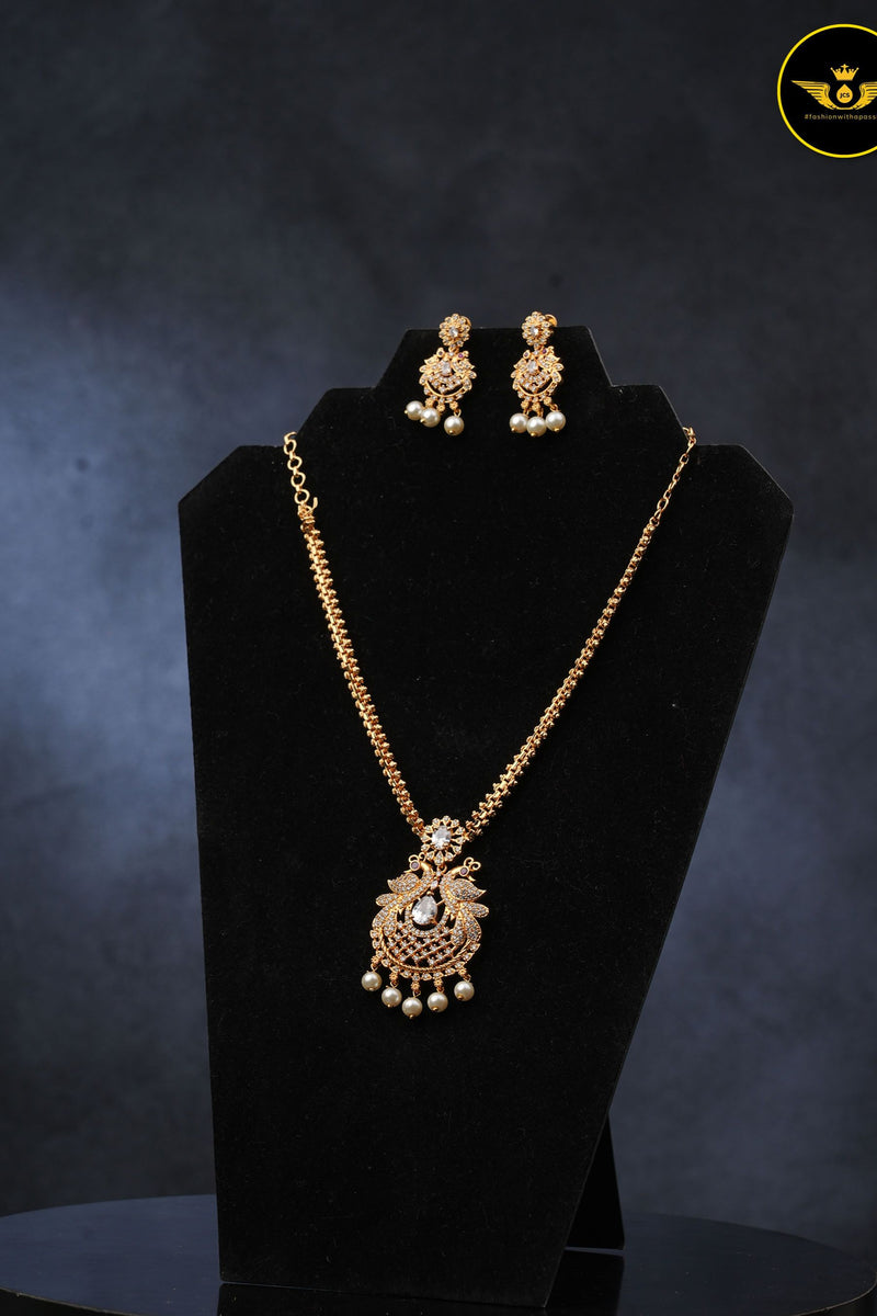 Radiant Peacock Gold-Plated Neckset with Earrings | Sparkling White Stones