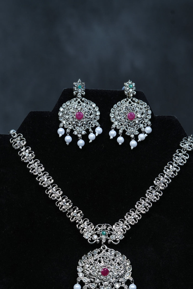 Radiant Charm: Silver Polish Neckset with Earrings at JCSFashions