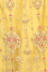 Heavy designer lehenga with embroidery & stone work in a pleasant yellow