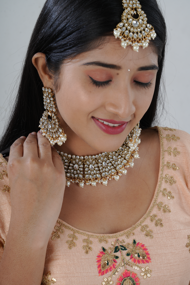 Opulent Kundan Neckset with Pearl Dangles and Tikka by JCS Fashions