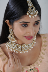 Opulent Kundan Neckset with Pearl Dangles and Tikka by JCS Fashions
