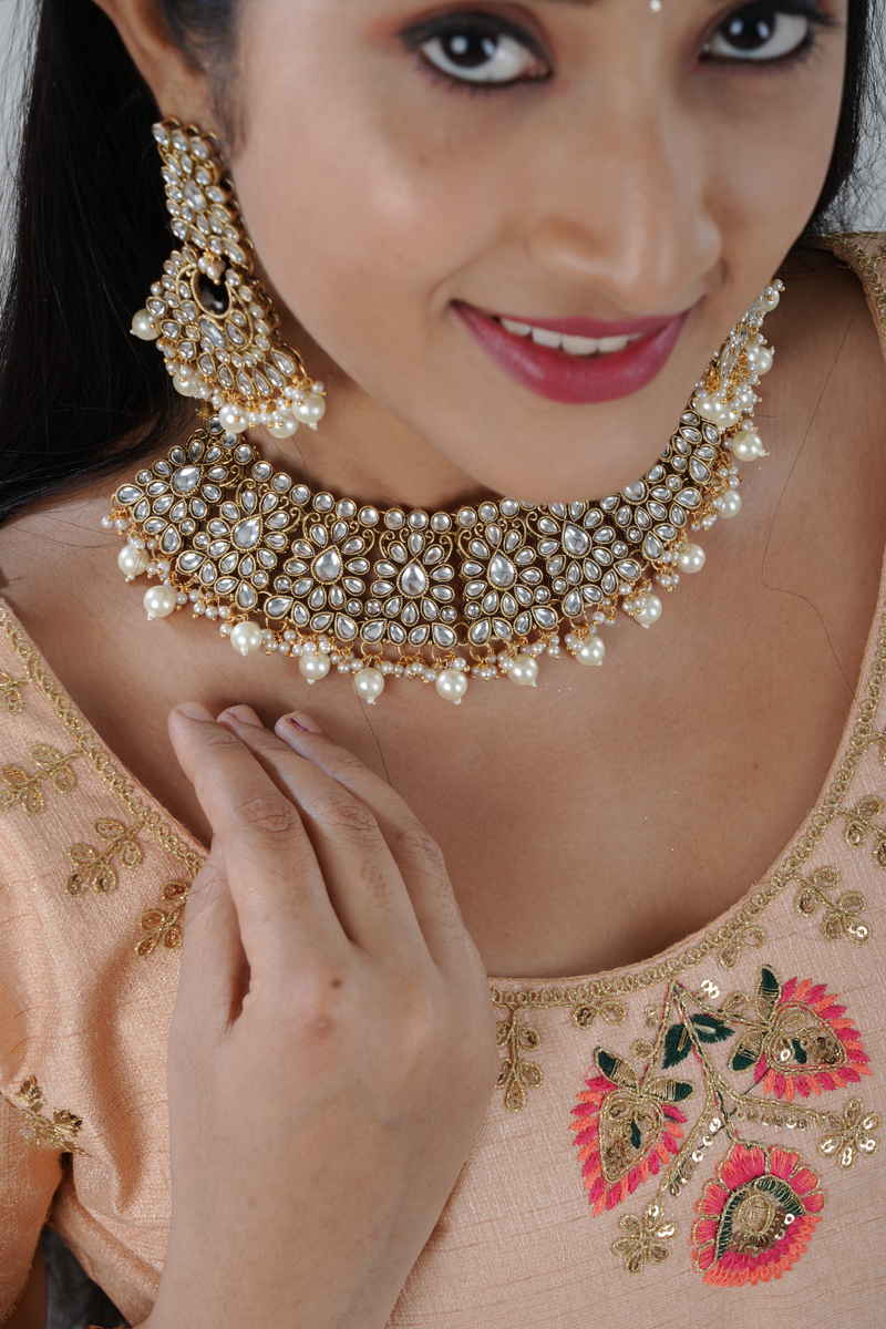 Opulent Kundan Neckset with Pearl Dangles and Tikka by JCS Fashions