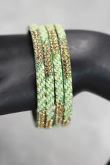 Multicolour Crystal Beaded Bangles Set with Gold-Tone Sparkle for Festive Wear and Weddings (Red/Light Blue/Purple) - Light Blue