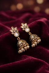 Floral Jhumka Earrings with Antique Gold-Tone Finish and Pearl Drop Dangles for Festive Wear - Onion pink