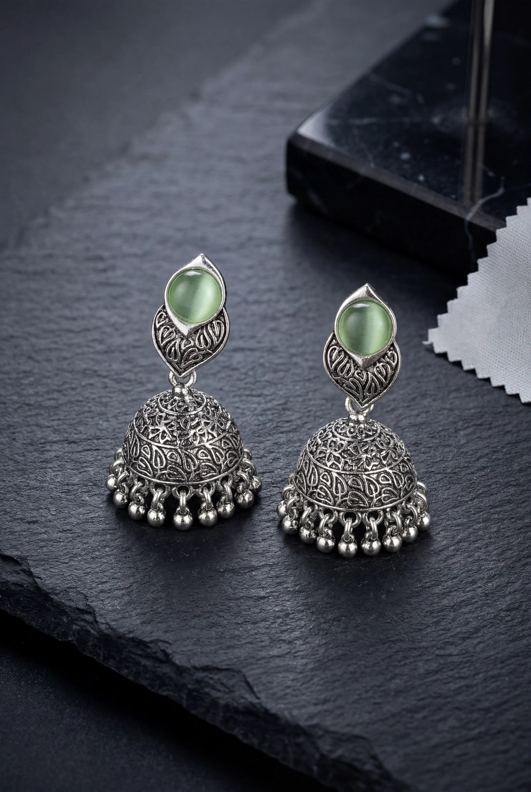 Oxidized Silver-Tone Jhumka Earrings with Round Stone & Leaf Connector, Gungroo Tassels - Pastel Green