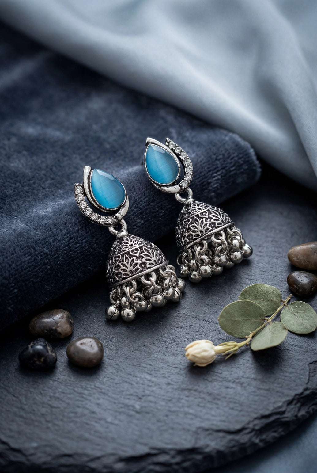 Oxidized Silver-Tone Oval Stone Jhumka Earrings with Floral Cutwork & Ghunghroo Beads - Sea blue