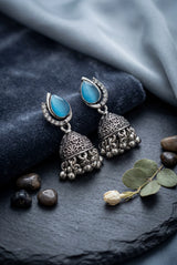 Oxidized Silver-Tone Oval Stone Jhumka Earrings with Floral Cutwork & Ghunghroo Beads - Sea blue