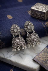 Oxidized Silver Tone Jhumka Earrings with Oval Stud Top & Filigree Teardrop Motif for Women - White