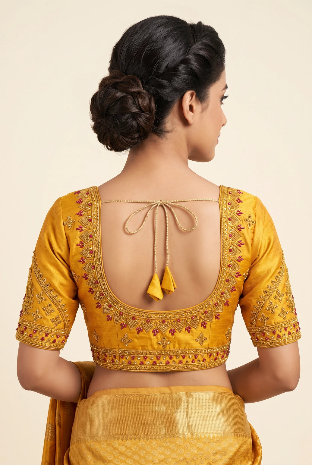 Yellow Designer Padded Blouse with Zari Work, Floral & Paisley Motifs, U-Neck, Elbow Sleeve and Back Knot