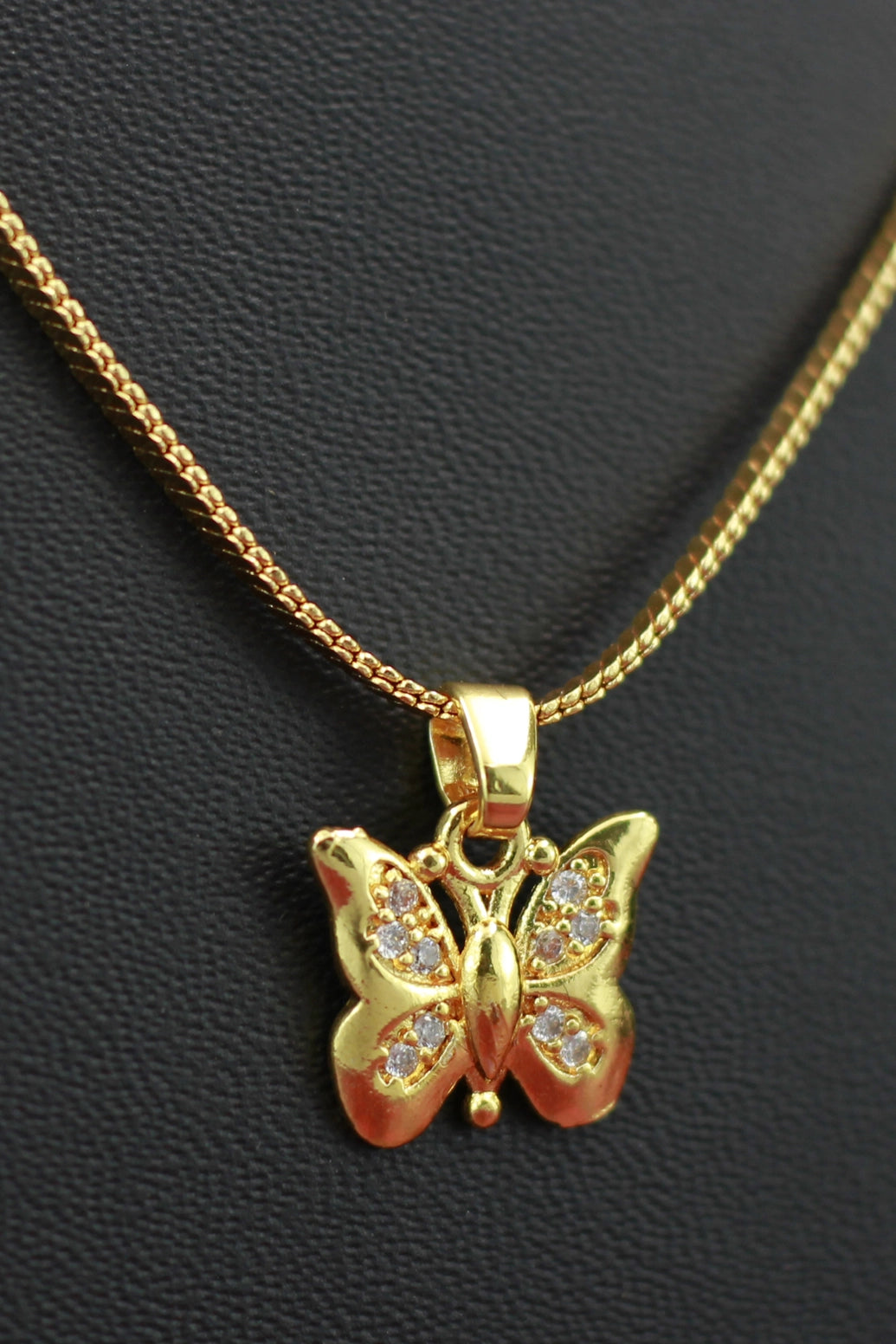 Gold-tone Textured Chain Necklace with Butterfly Pendant, Jeweled Finish for Traditional and Festive Wear