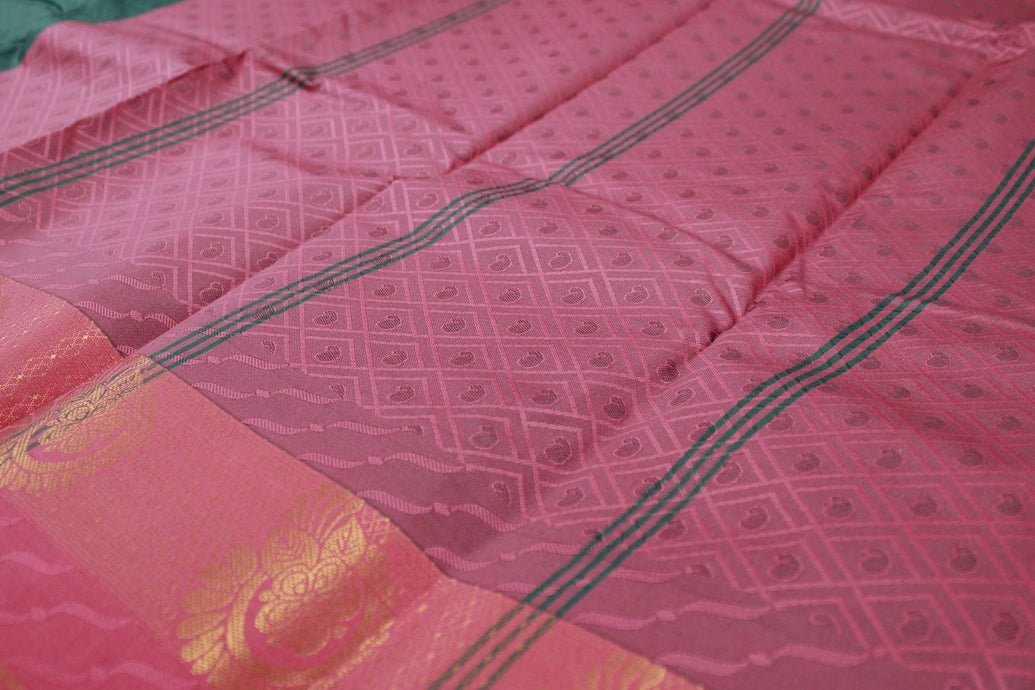 Dark Green Emboss Silk Saree with Traditional Border Design