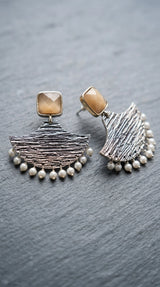 Cream Stone Silver-Tone Textured Teardrop Dangle Earrings with Pearl Drops for Festive Party Wear