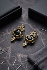 Antique-Style Black Stud Earrings with Oval Stone and Gold-Tone Bead Detailing for Traditional Wear