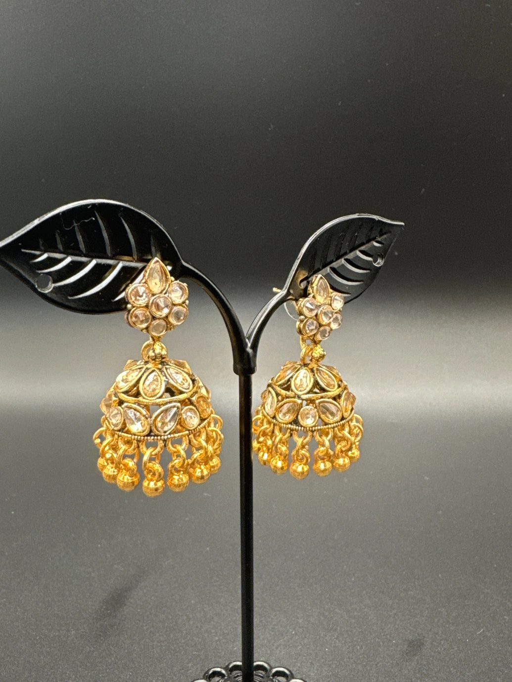 Antique Gold Floral Kundan Jhumka Earrings with Champagne Stones