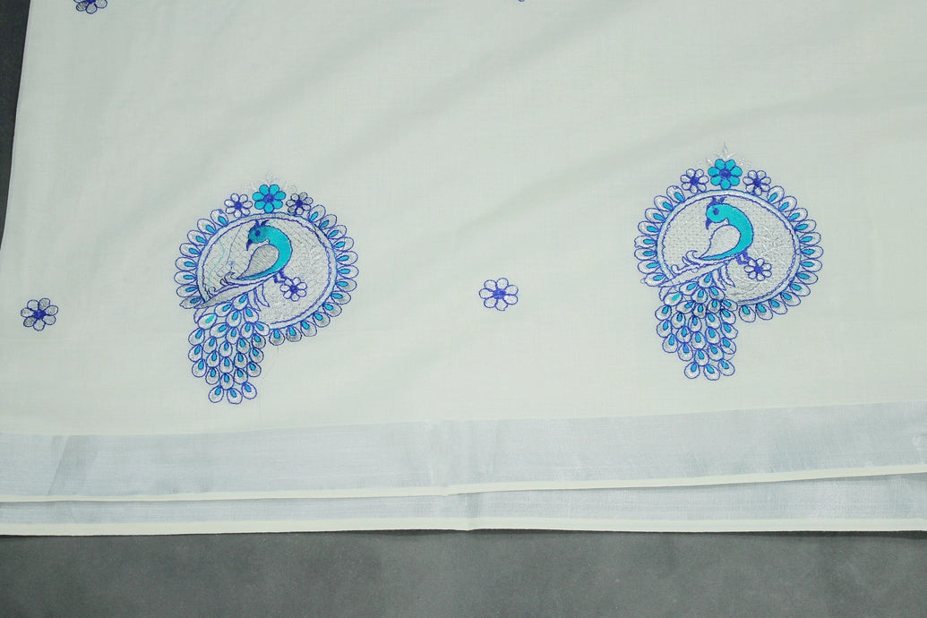 Half White Kerala Cotton Saree with Peacock Embroidery and Silver Zari Thread Work