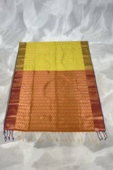 Orange Soft Silk Saree with Delicate Gold Zari Buttas and Floral Border