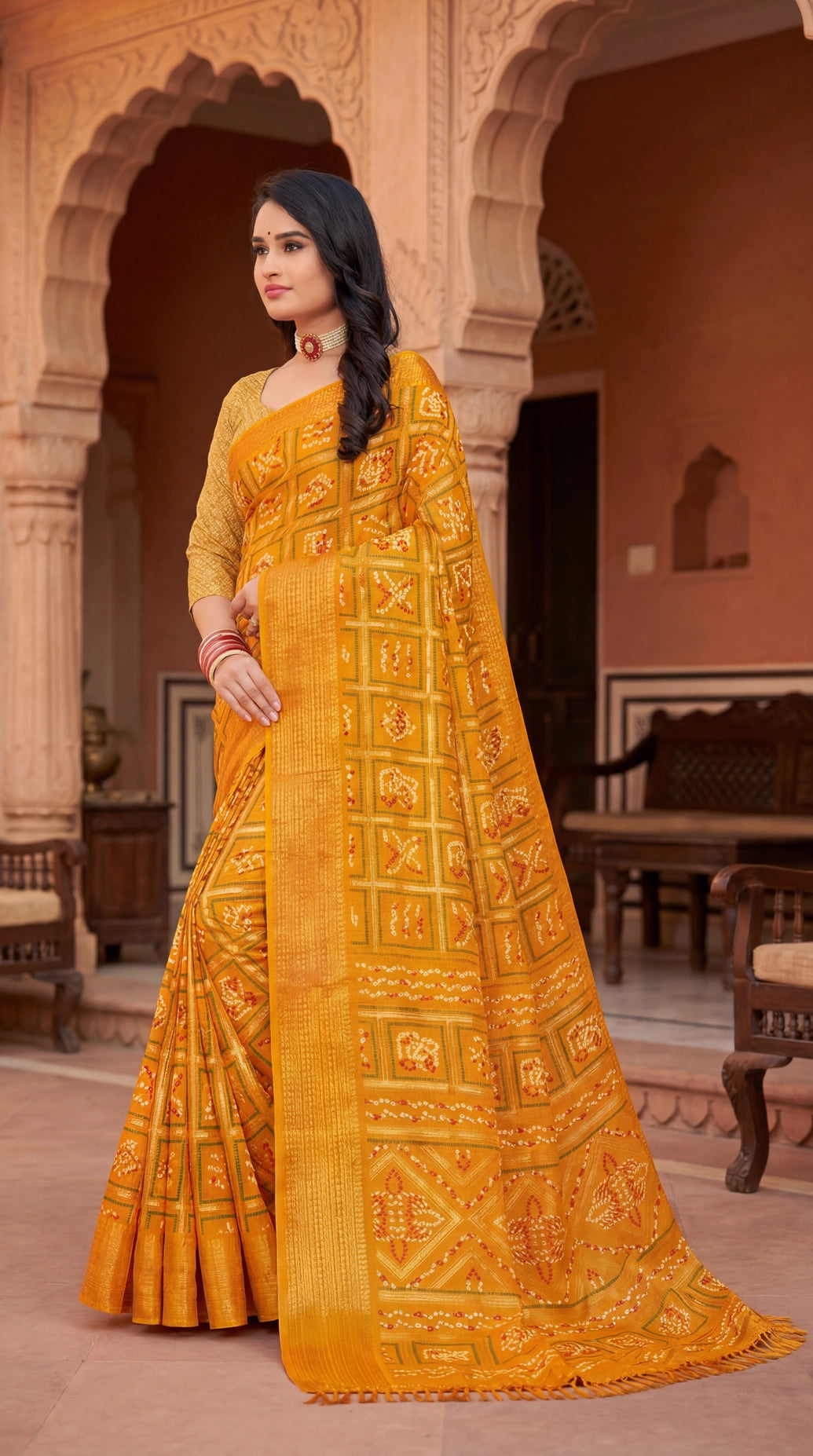 Yellow Bandhani Print Chiffon Saree with Gold Zari Motifs and Broad Border for Festive Wear