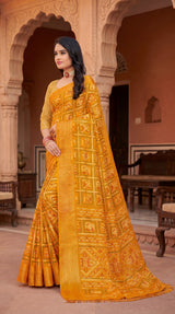 Yellow Bandhani Print Chiffon Saree with Gold Zari Motifs and Broad Border for Festive Wear