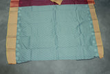 Maroon Emboss Silk Saree with Contrast Zari-Style Border and Semi Silk Design
