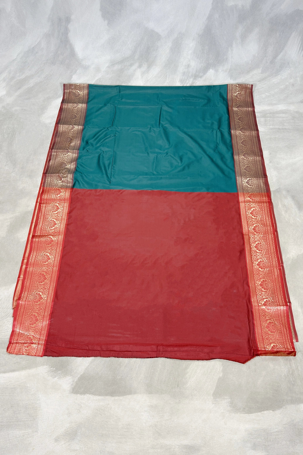 Teal Blue Pure Silk Saree with Heavy Pallu Border and Contrast Blouse Piece